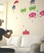 Space Invader decals on the living room wall
